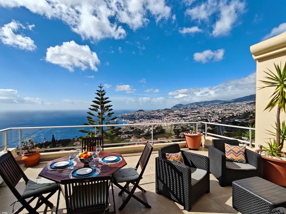 Private outdoor space, fully furnished and offering panoramic views of Funchal Bay and the mountains