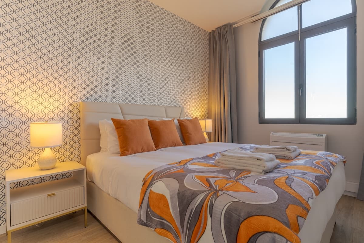 Spacious queen-size bed ensuring a restful night’s sleep