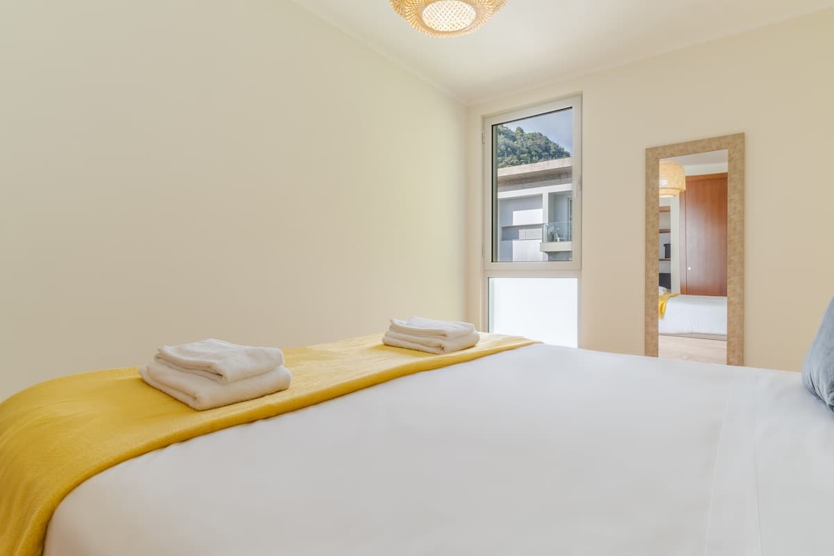 Quarto com cama queen size