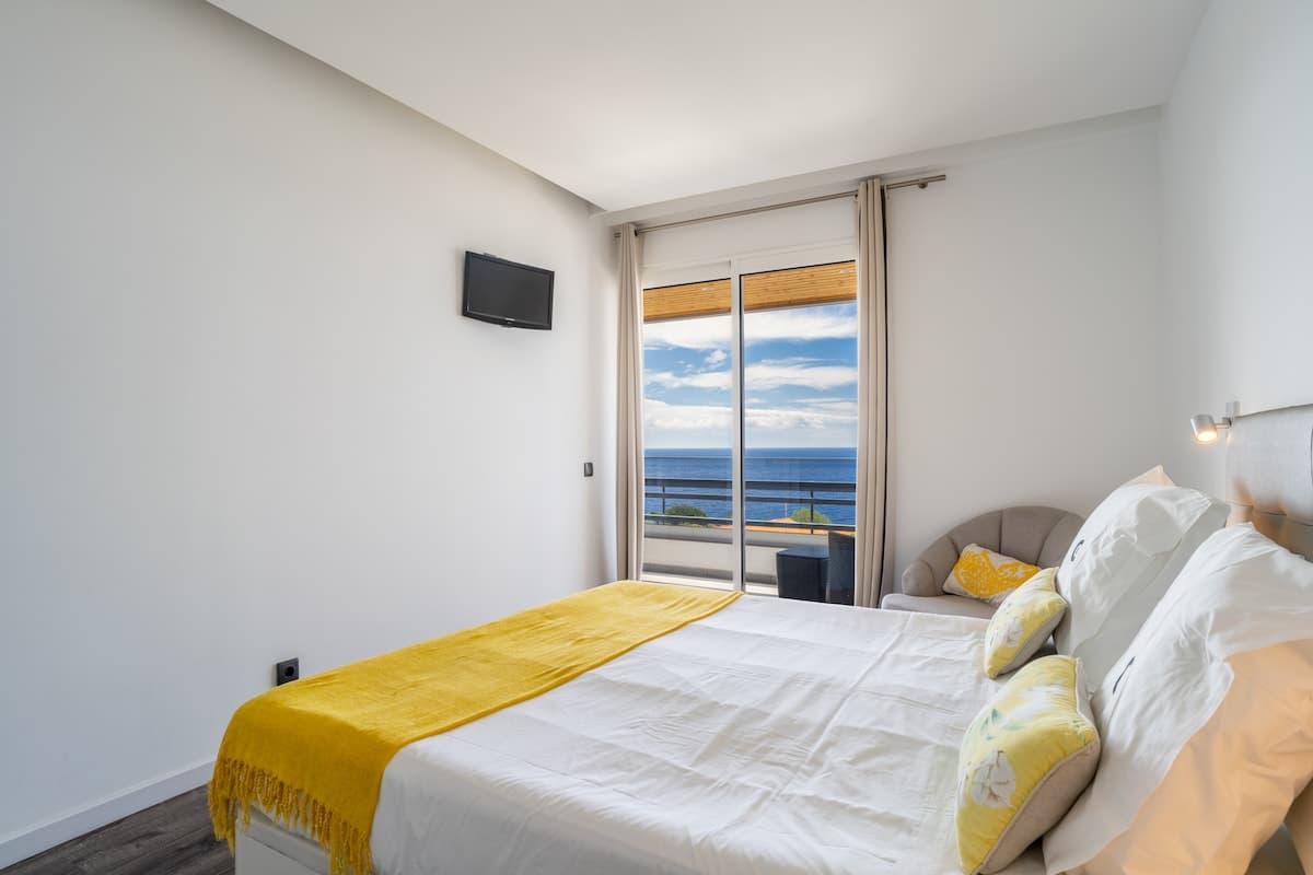 Quarto com cama King Size