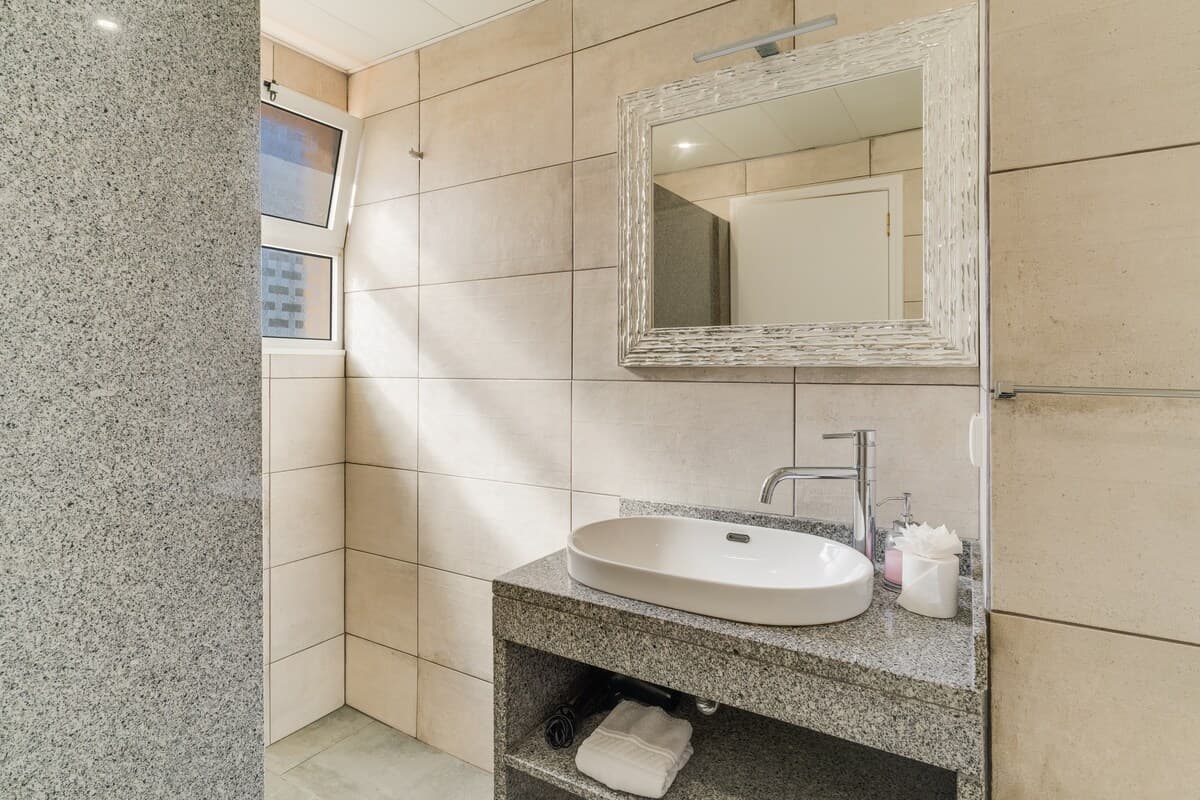Complete bathroom with a shower